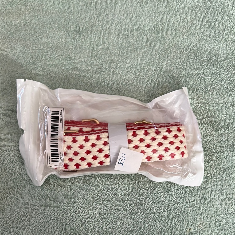 Red and White Patterned Strap with Gold Colored hardware